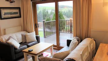 Luksusmökki, oma kylpyhuone, vuoristonäköala (Swallows Cottage) | Lounge
