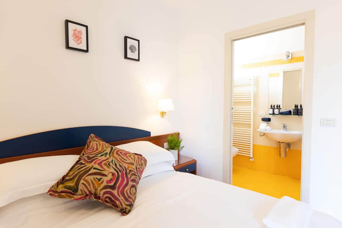 Familie appartement | 1 slaapkamer, luxe beddengoed, een kluis op de kamer, een bureau