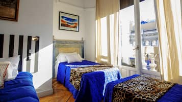 Family Studio Suite, Refrigerator & Microwave, Tower | Premium bedding, desk, blackout drapes, iron/ironing board