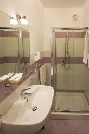 Shower, free toiletries, hair dryer, bathrobes