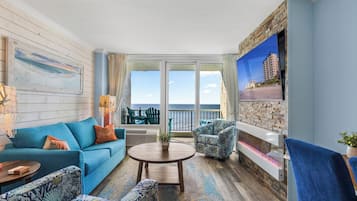 Deluxe Condo, 1 Bedroom, Ocean View, Oceanfront (1005) | Living area | TV, DVD player