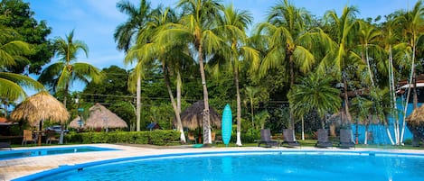 4 outdoor pools, open 8:00 AM to 10:00 PM, pool loungers