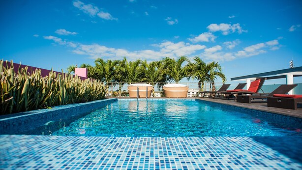 Apartment, Multiple Beds, City View (DCA01 Spectacular n cozy condo w outd) | Pool | Outdoor pool, a rooftop pool, open 7:00 AM to midnight, pool loungers - Doca By Playa Moments (Playa del Carmen)