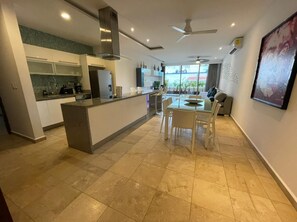 Apartment, Multiple Beds, City View (DCA01 Spectacular n cozy condo w outd) | Private kitchen | Full-size fridge, microwave, oven, stovetop - Doca By Playa Moments (Playa del Carmen)