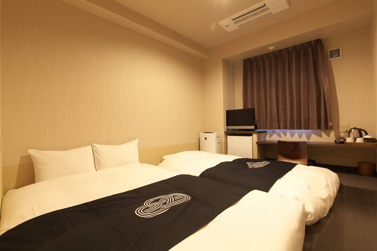 down duvets, desk, laptop workspace, blackout curtains