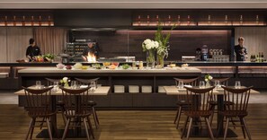 A modern restaurant with a central island, bar area, and seating arrangement. - Nanki-Shirahama Marriott Hotel (Shirahama)