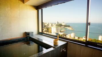 Combined shower/tub, free toiletries, hair dryer, slippers