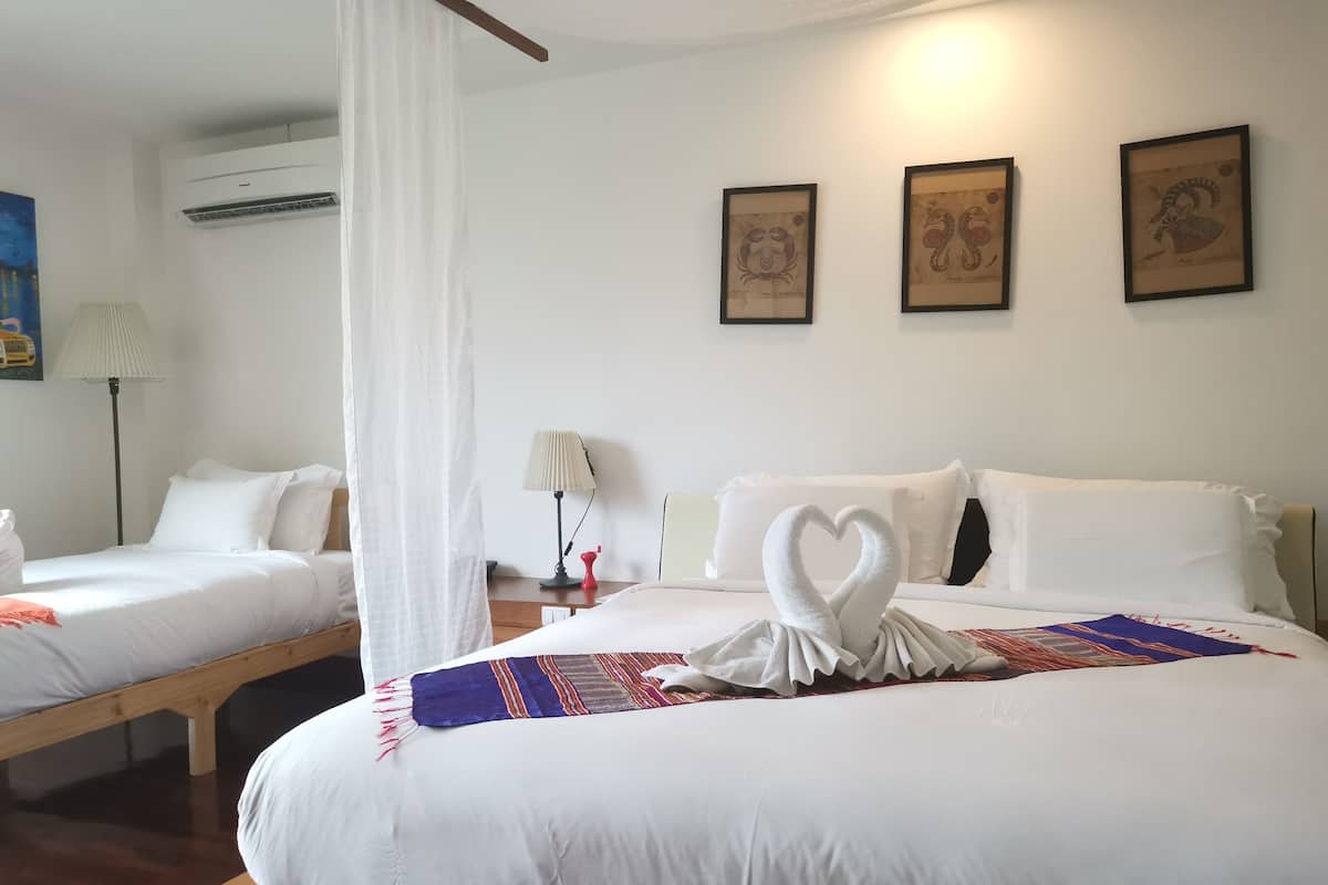 Family Triple Room | 1 bedroom, minibar, in-room safe, individually furnished