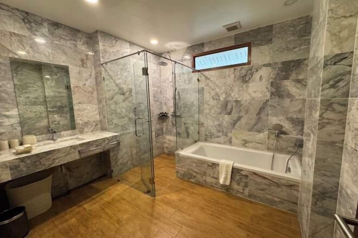 Deep soaking tub, rainfall showerhead, free toiletries, hair dryer