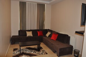 Superior Apartment, 1 Bedroom, Accessible, Executive Level | Living room | 42-inch LED TV with satellite channels, TV, heated floors