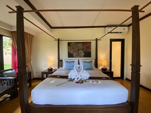 Suíte luxo | Escrivaninha, camas extras/dobráveis (sobretaxa), Wi-Fi de cortesia