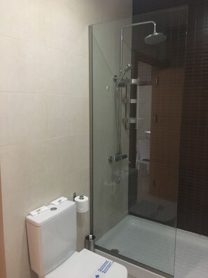 Shower, free toiletries, hair dryer, slippers
