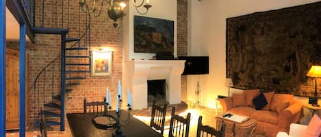 Flat-screen TV, fireplace, pay films