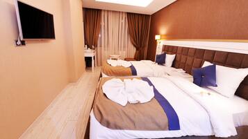 标准房 | 迷你吧(备有免费物品)、客房内保险箱、办公桌、隔音