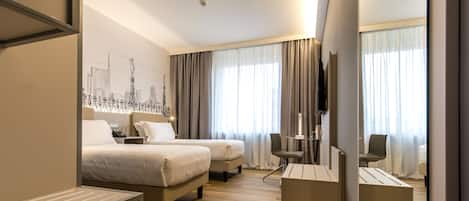 Dobbeltrom for 1 person – superior | Sengetøy av topp kvalitet, dundyner, minibar og safe på rommet