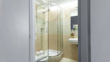 Room | Bathroom | Shower, rainfall showerhead, designer toiletries, hair dryer