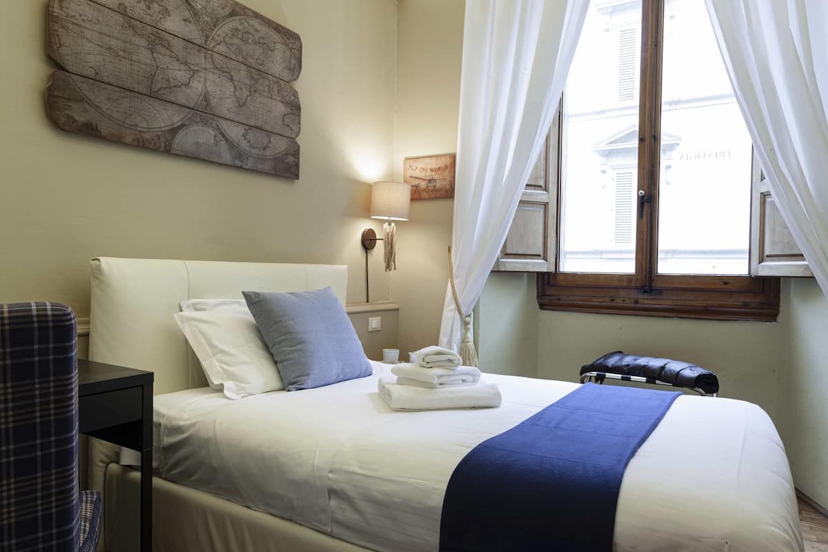 Premium bedding, down comforters, memory foam beds, minibar