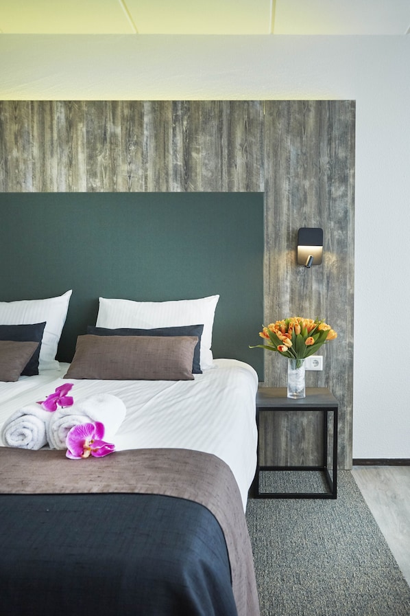 Hypoallergeen beddengoed, verduisterende gordijnen, geluiddichte muren