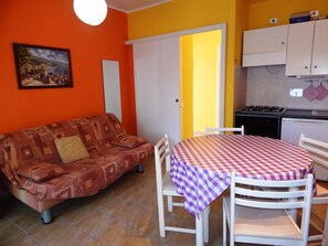 Apartment, 1 Bedroom | Living area | TV - AffittaSardegna - Gabbiano Apartments (Stintino)