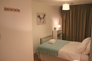 Appartement Deluxe, 1 chambre | 1 chambre, fer et planche à repasser, Wi-Fi gratuit