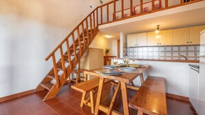 Apartment, 1 Bedroom (Ruinas 2) | Private kitchen | Full-sized fridge, stovetop, cookware/dishes/utensils - AffittaSardegna - Ruinas Apartments (Olbia)