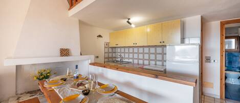 Departamento, 1 habitación (Ruinas 1) | Cocina privada | Refrigerador con congelador, parrilla de estufa y utensilios de cocina