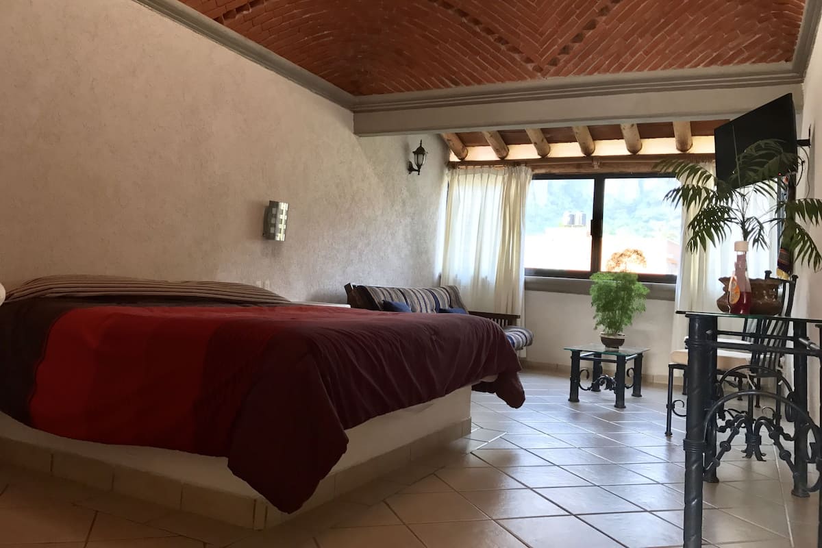 Junior Suite, 1 Bedroom, Mountain View, Tower | Desk, iron/ironing board (on request), rollaway beds, free WiFi