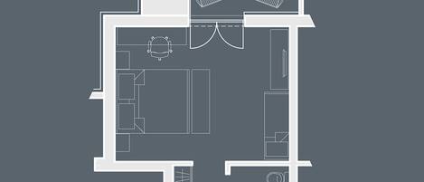 A floor plan with a living area, kitchen, two bedrooms, and a bathroom.