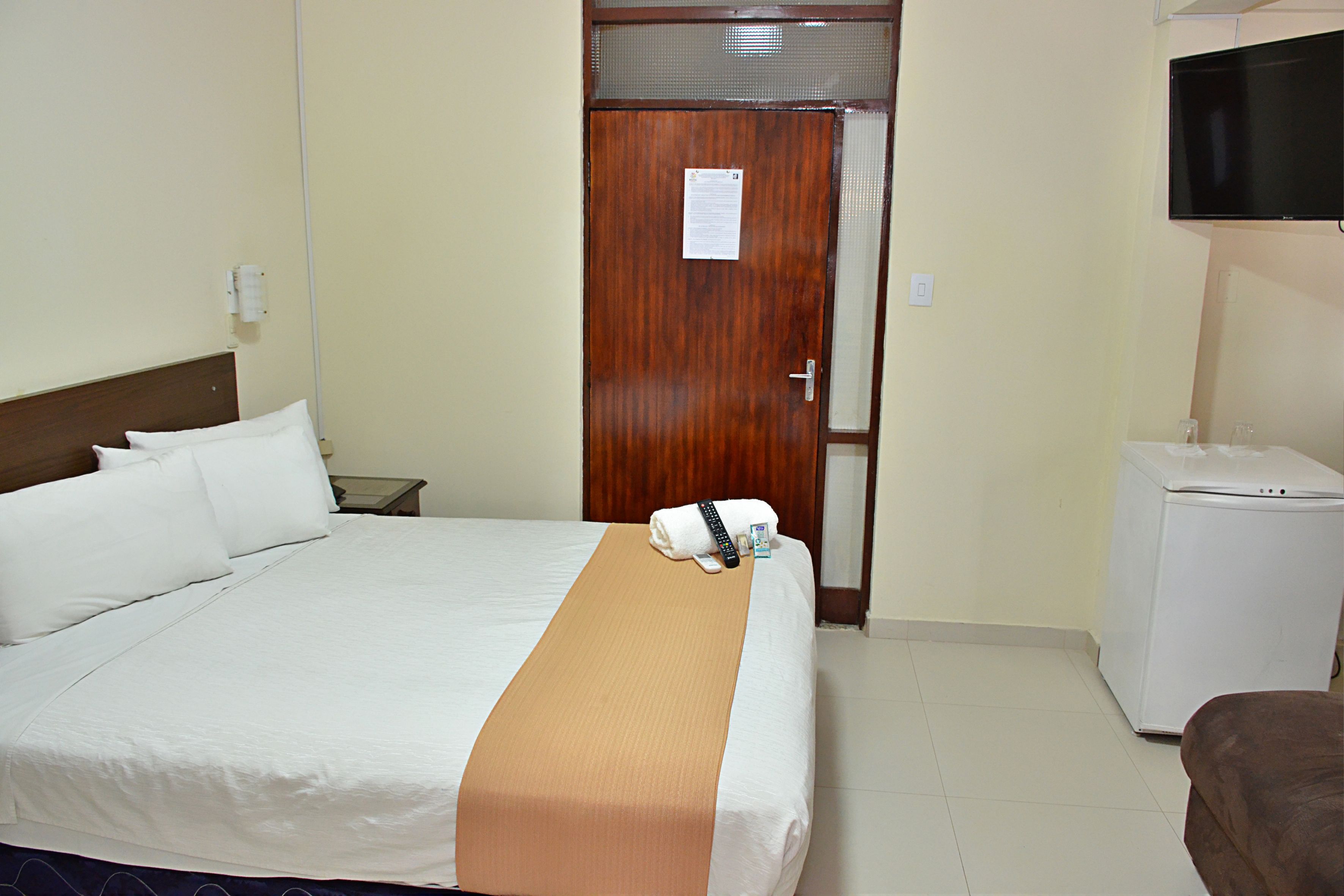 Executive Single Room | Minibar, in-room safe, iron/ironing board, free cribs/infant beds
