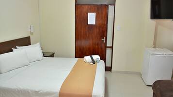 Executive Single Room | Minibar, in-room safe, iron/ironing board, free cribs/infant beds