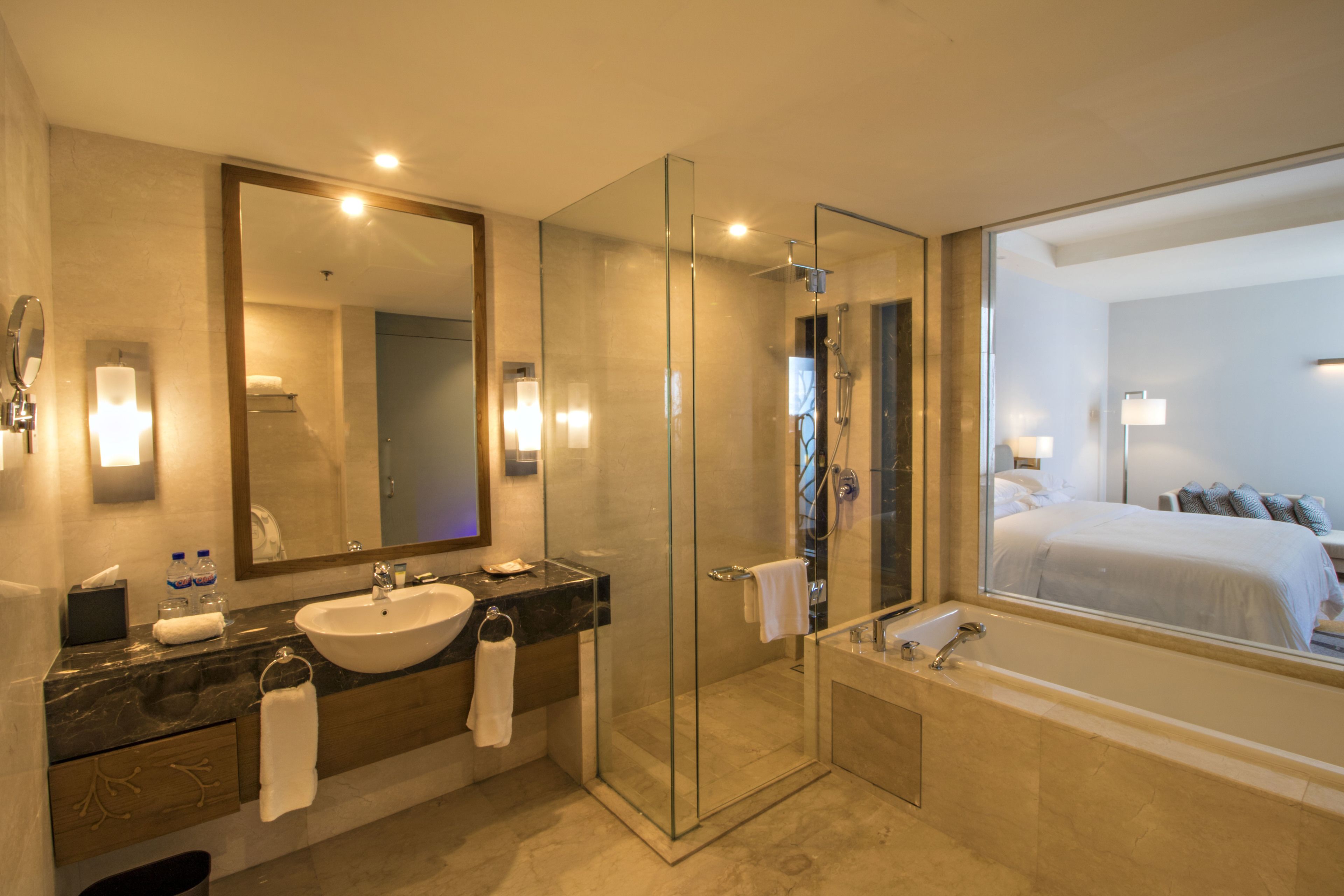 grand suite, 1 king bed, non smoking, sea view | bathroom | free toiletries, hair dryer, bathrobes, slippers