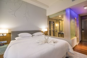 Room, 1 King Bed, Sea View | In-room safe, desk, laptop workspace, blackout drapes