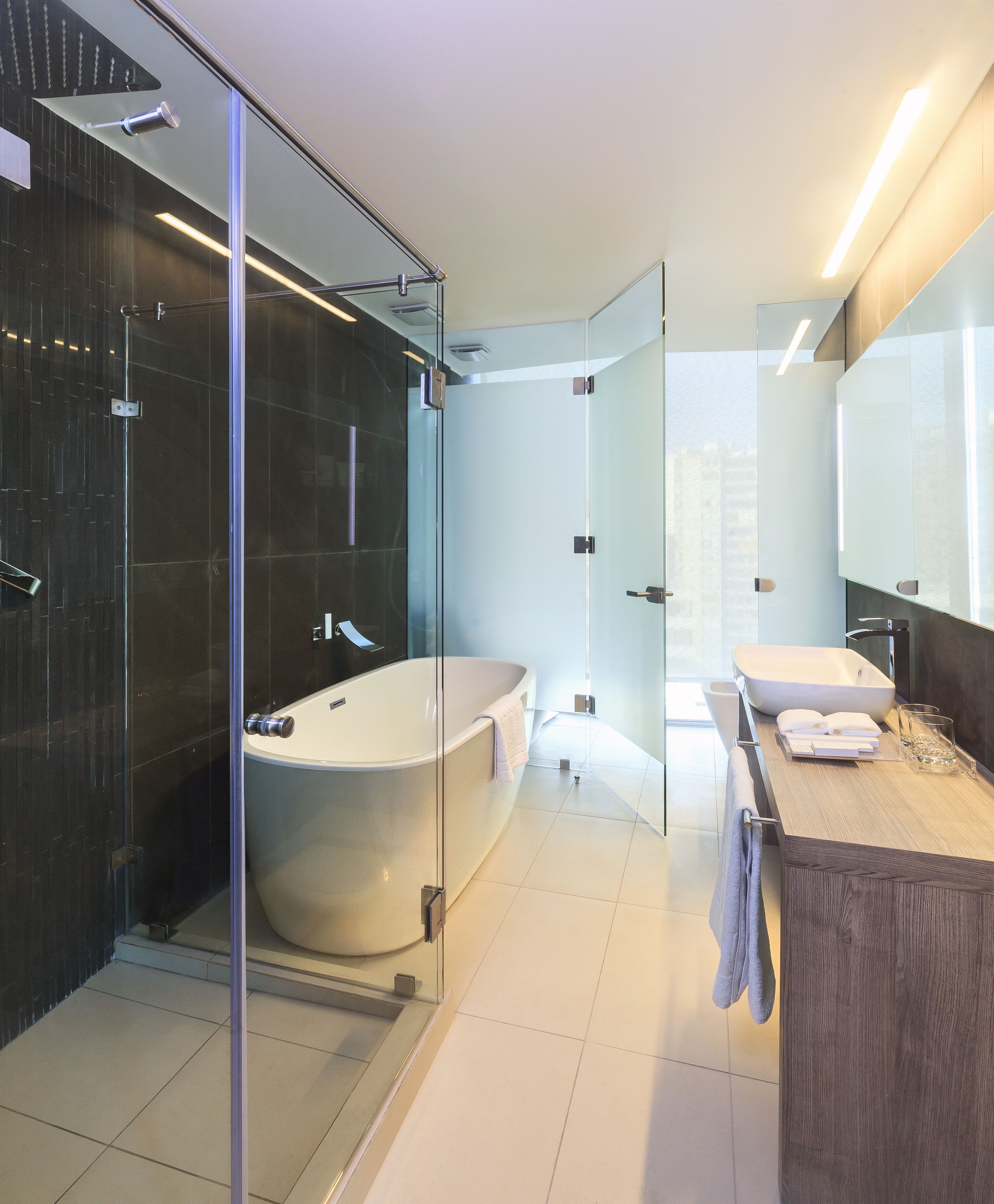 superior suite, 1 king bed (corner) | bathroom | shower, rainfall showerhead, free toiletries, hair dryer
