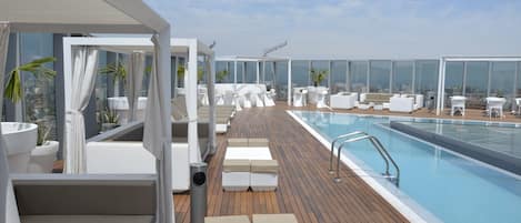 Indoor pool, outdoor pool, pool umbrellas, pool loungers