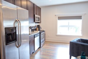 Deluxe Suite, 2 Bedrooms, Kitchen | Private kitchen | Fridge, microwave, coffee/tea maker