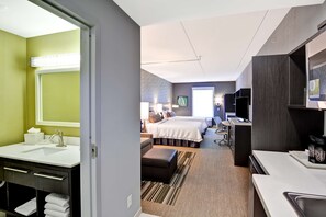 Desk, laptop workspace, blackout drapes, iron/ironing board