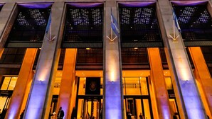 The exterior of the Alvear Icon Hotel & Residences with its modern architecture and illuminated entrance.