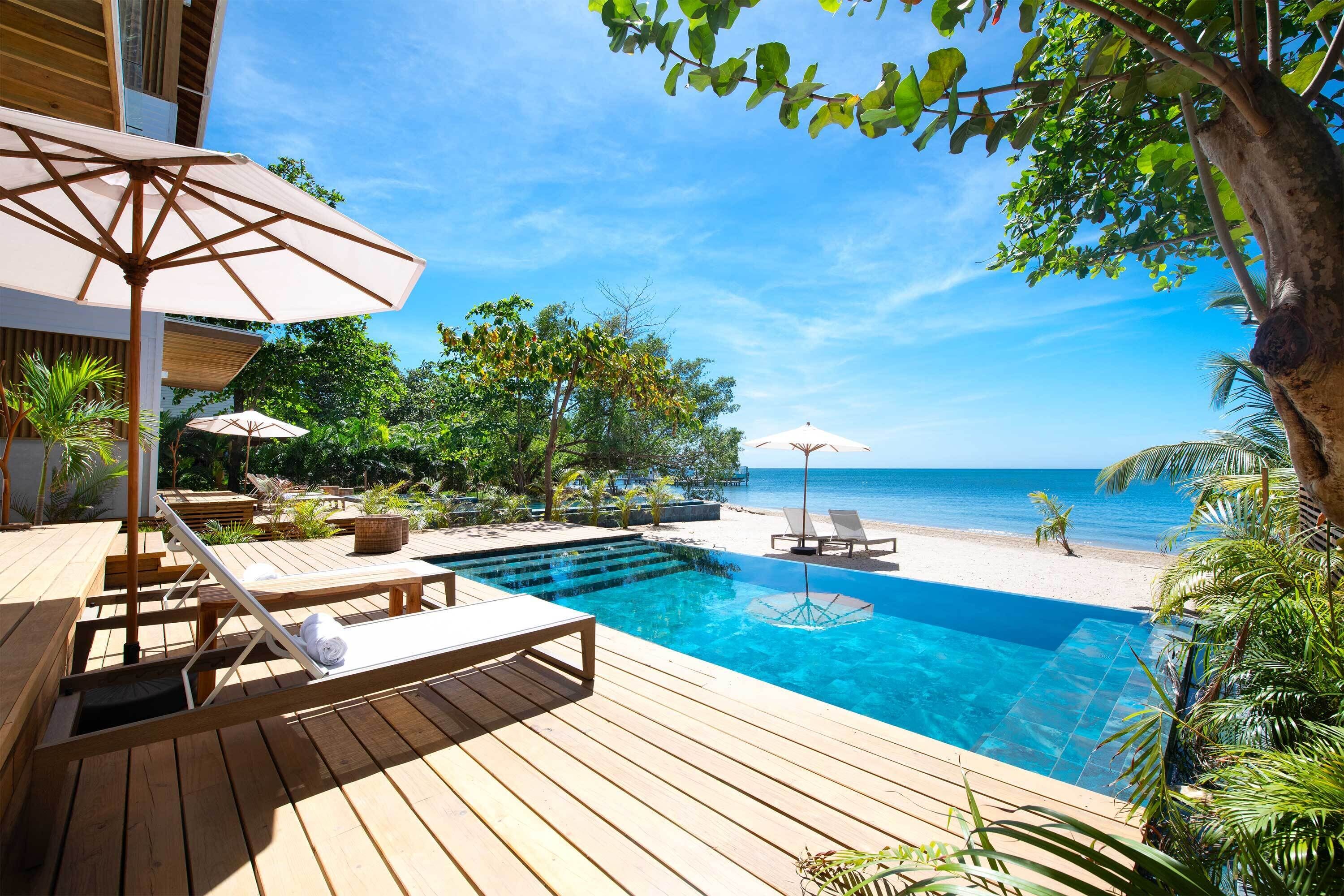 Casa família, vista para o jardim | Roupas de cama premium, frigobar, cofres nos quartos