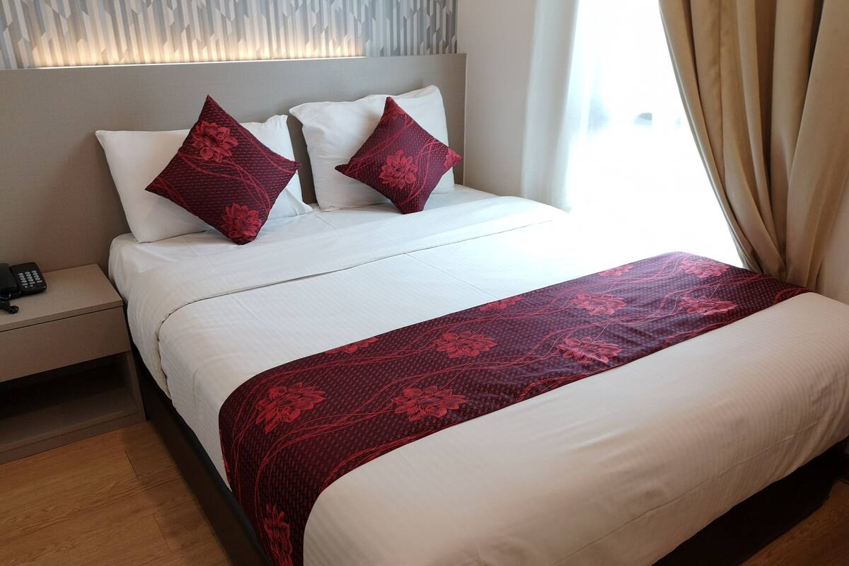 Chambre Deluxe avec lits jumeaux | Bureau, chambres insonorisées, fer et planche à repasser, Wi-Fi gratuit