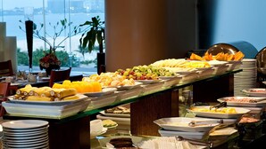 A buffet with various fruits, vegetables, and meats. - Liyya Water Villas (Dambulla)