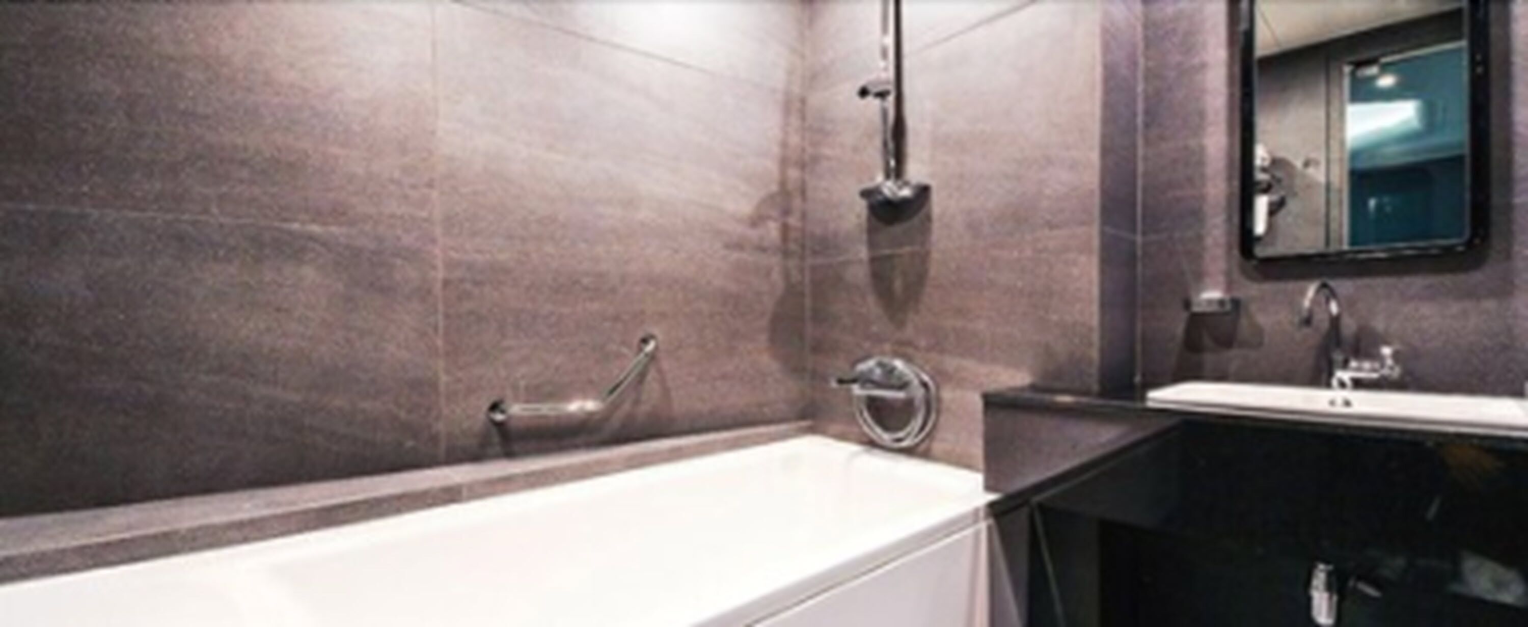 deluxe twin room (for 3 people mixed gender stay, family only allowed) | bathroom | free toiletries, towels