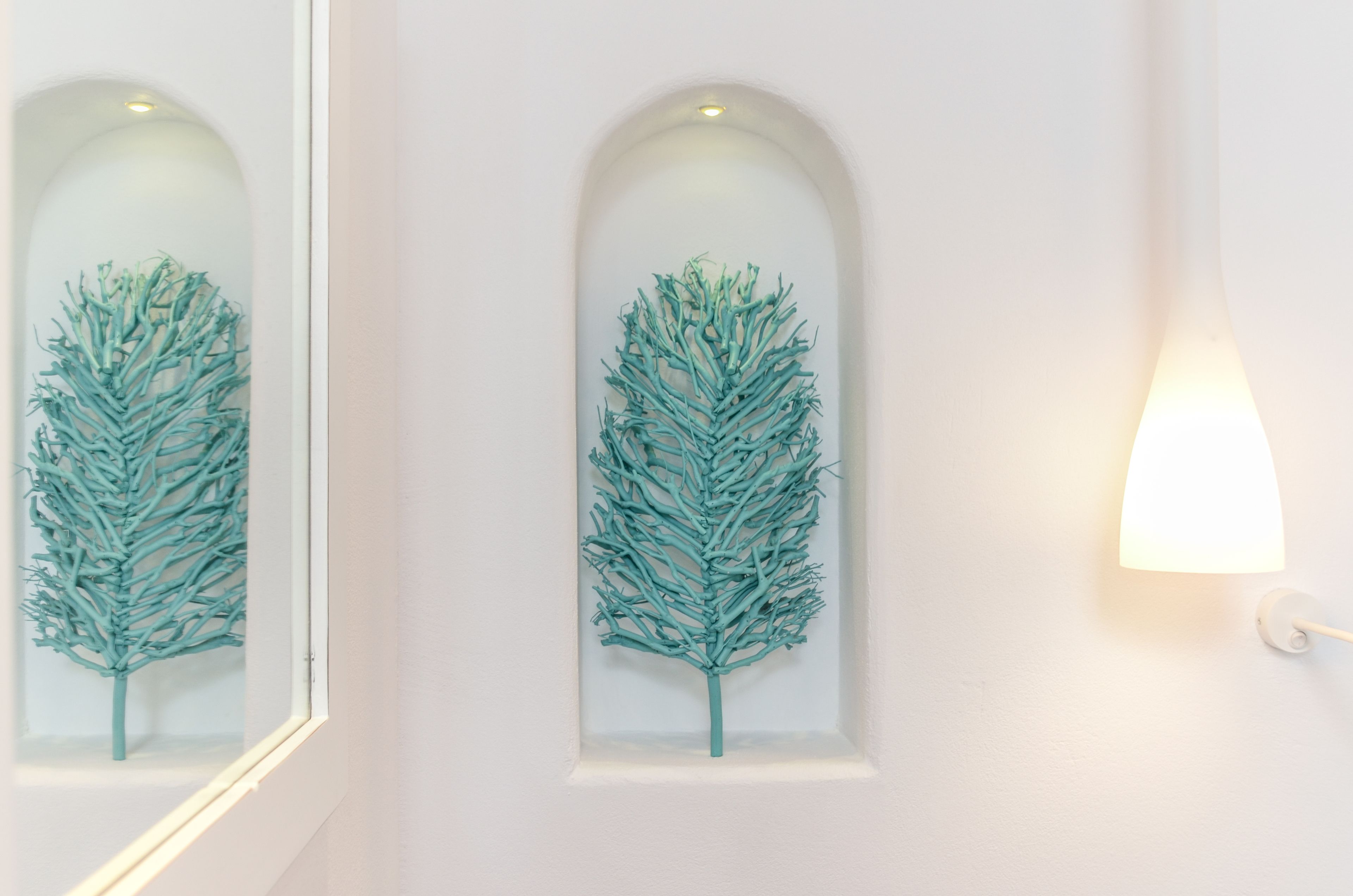 A wall-mounted light fixture with a modern design.