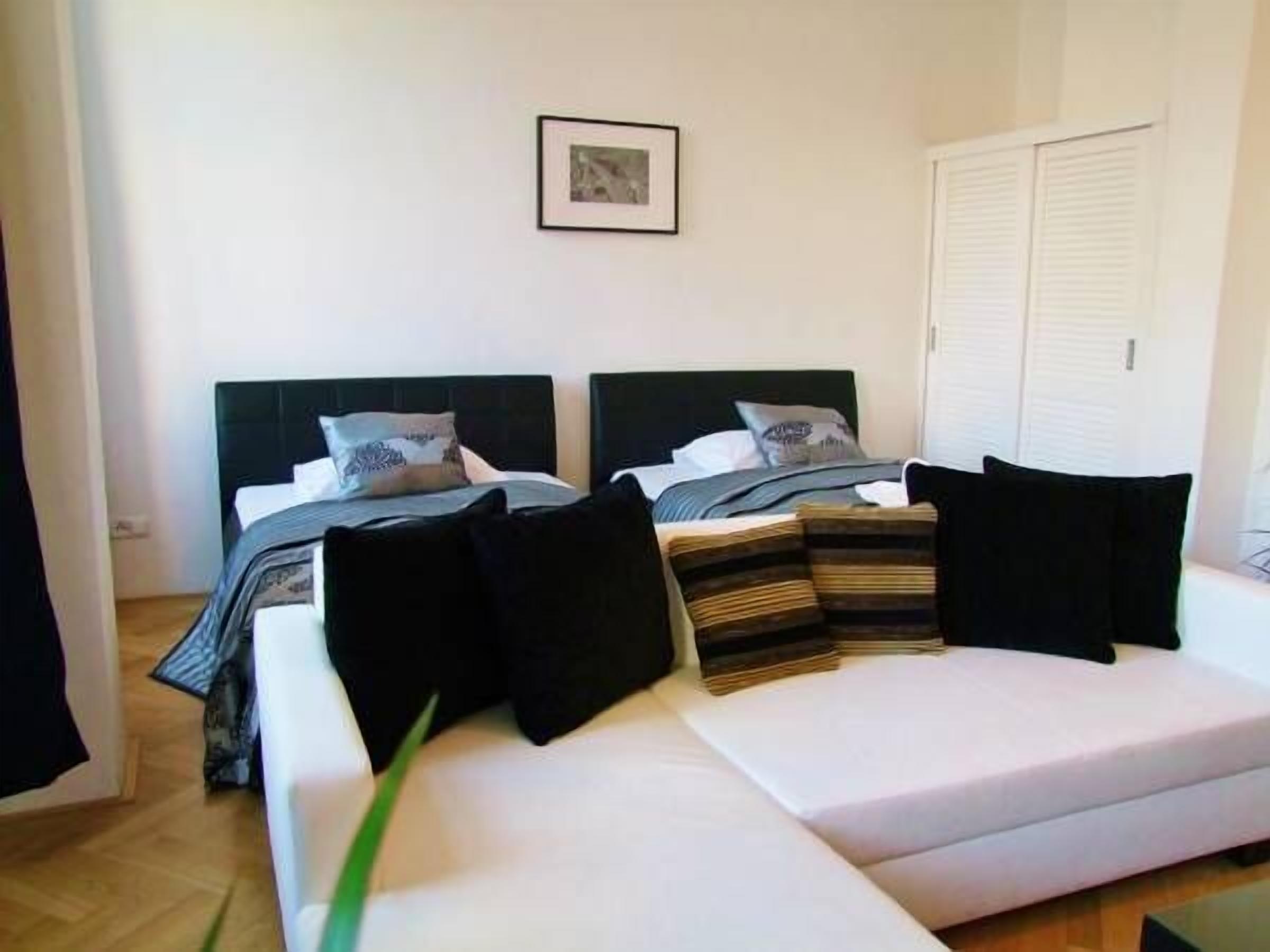 premium apartment, 1 bedroom, city view | living area | flat-screen tv