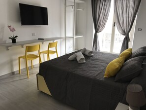 Standaard kamer, privébadkamer | Een bureau, verduisterende gordijnen, gratis wifi, beddengoed