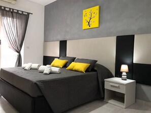 Standaard kamer, privébadkamer | Een bureau, verduisterende gordijnen, gratis wifi, beddengoed