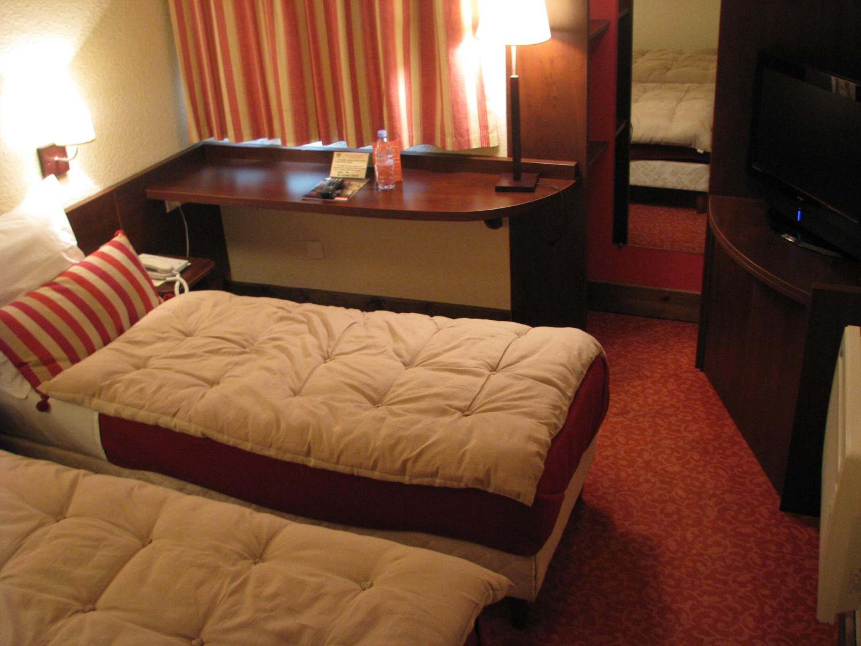 premium bedding, desk, blackout curtains, soundproofing