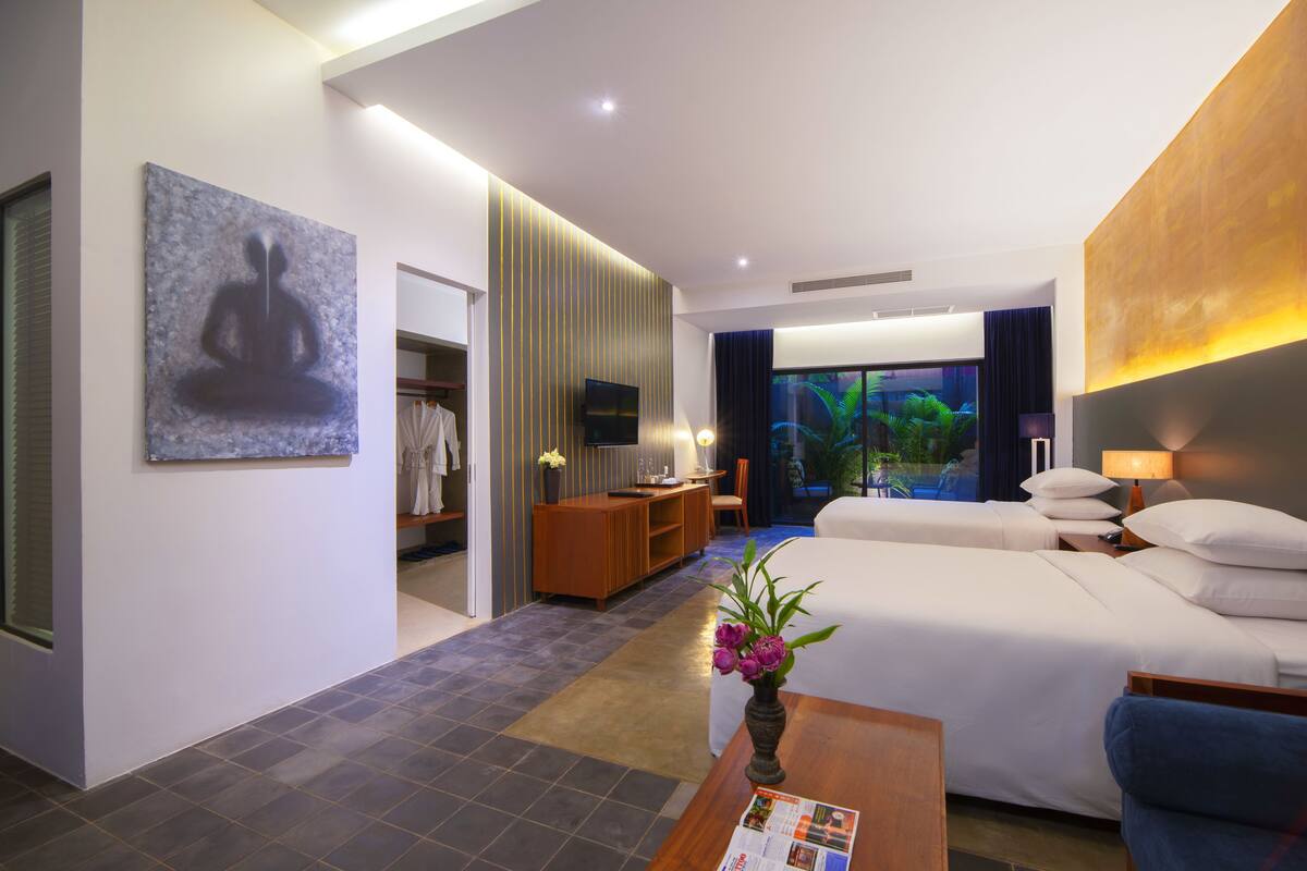 Chambre Double Exécutive, plusieurs lits, baignoire | Vue de la chambre