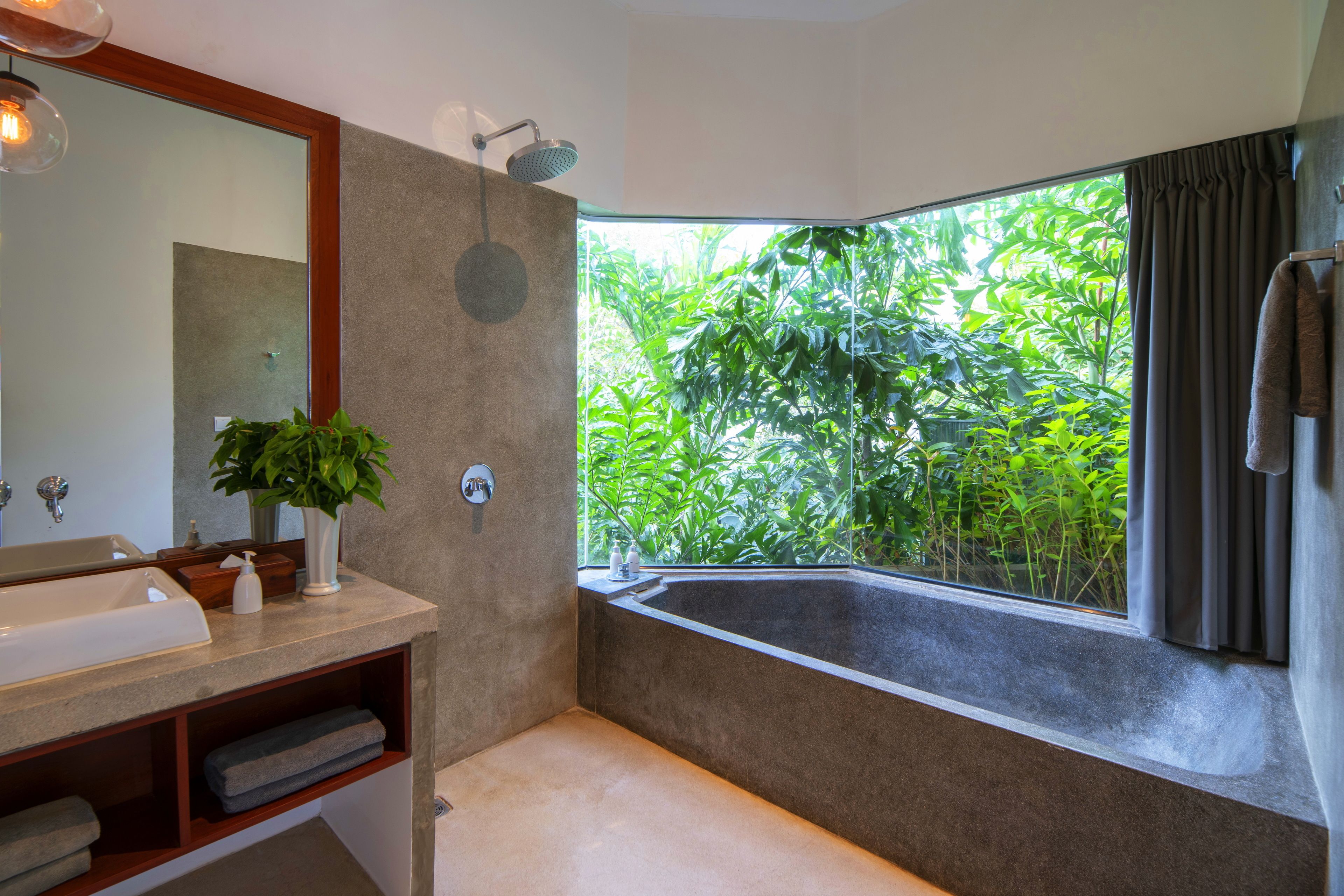 separate bathtub and shower, deep-soaking bathtub, rainfall showerhead