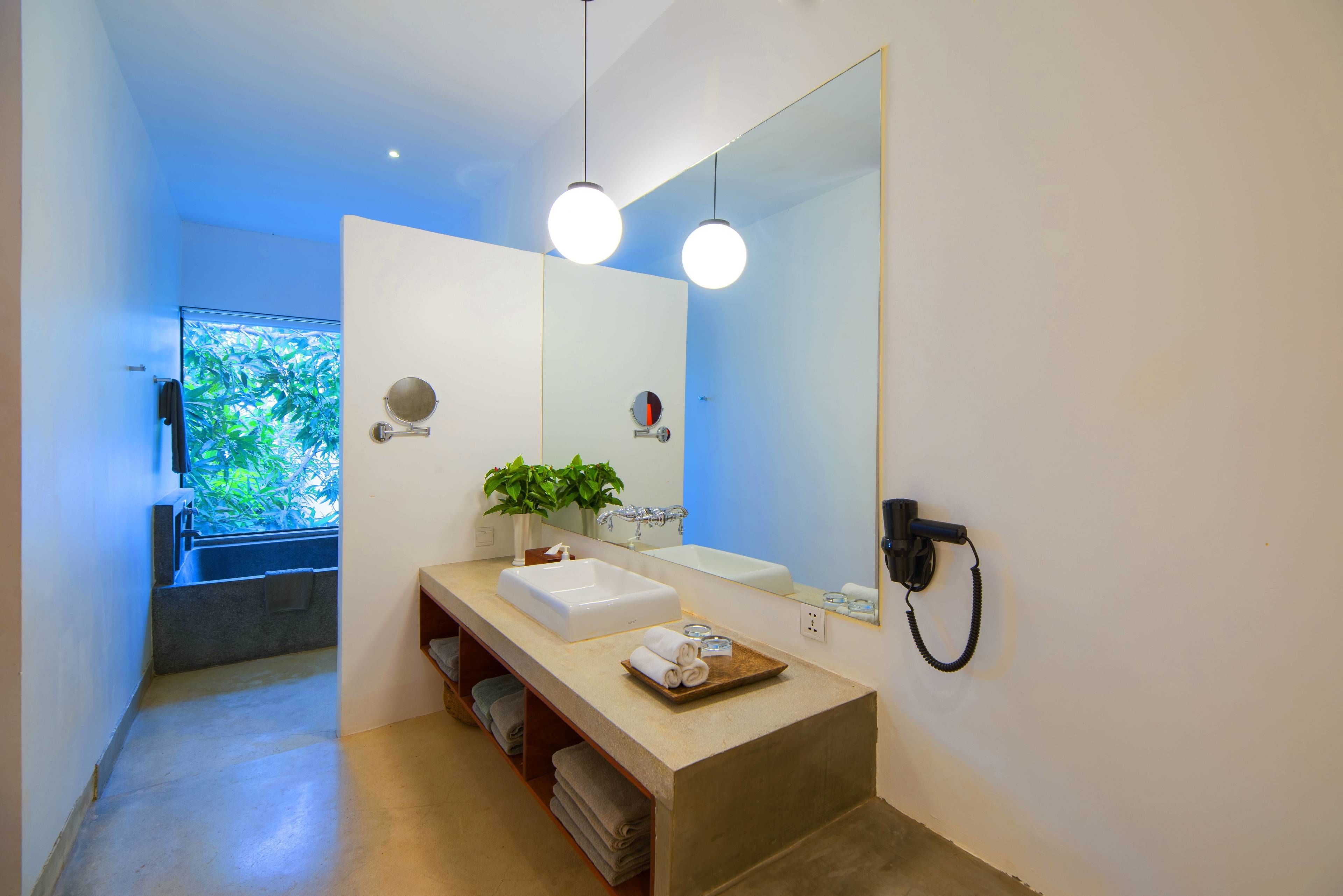 separate bathtub and shower, deep-soaking bathtub, rainfall showerhead