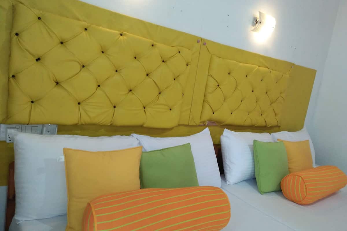 family triple room, 1 bedroom, garden view, garden area | room amenity